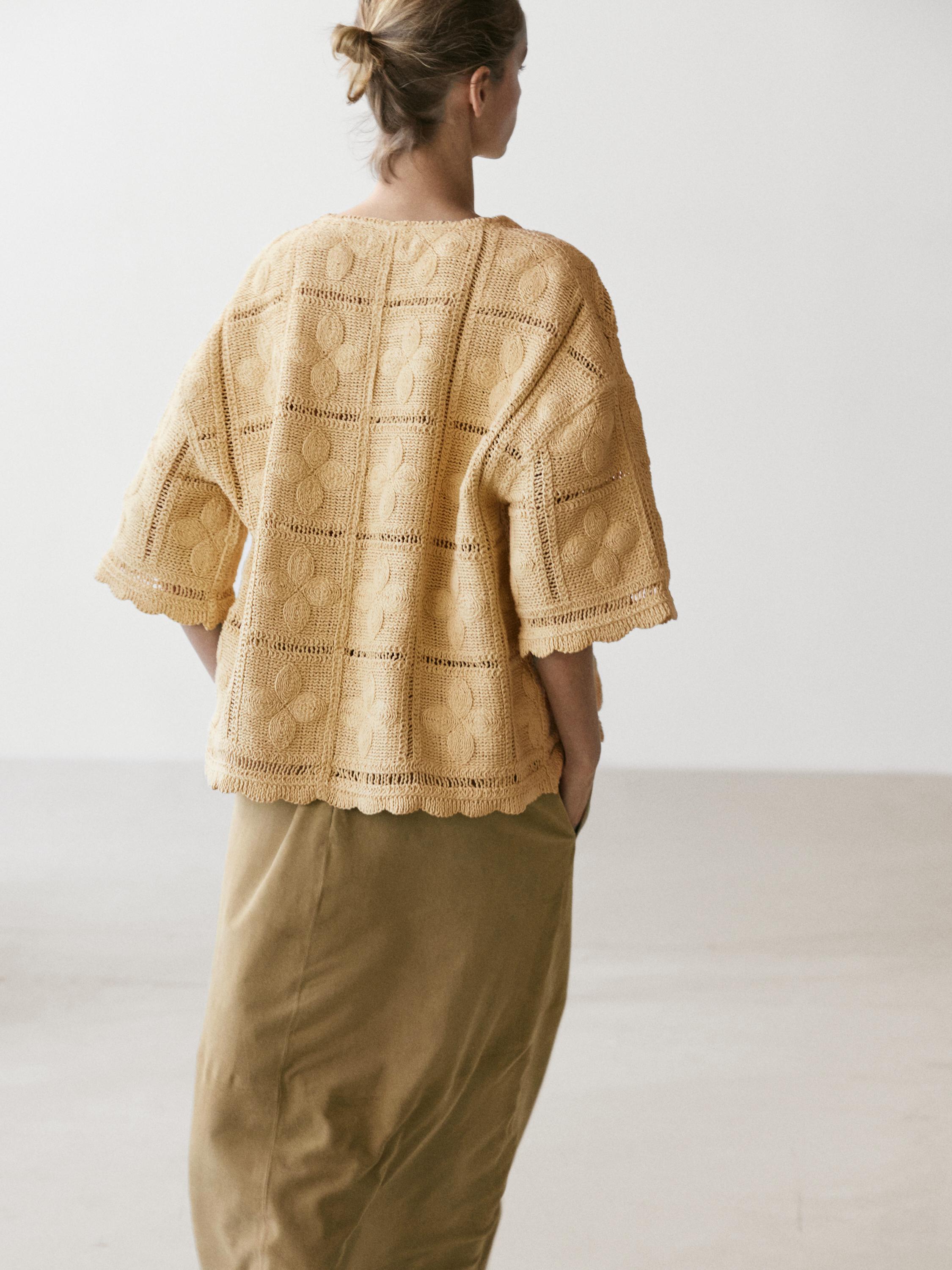 Veste en maille ajourée et crochet
